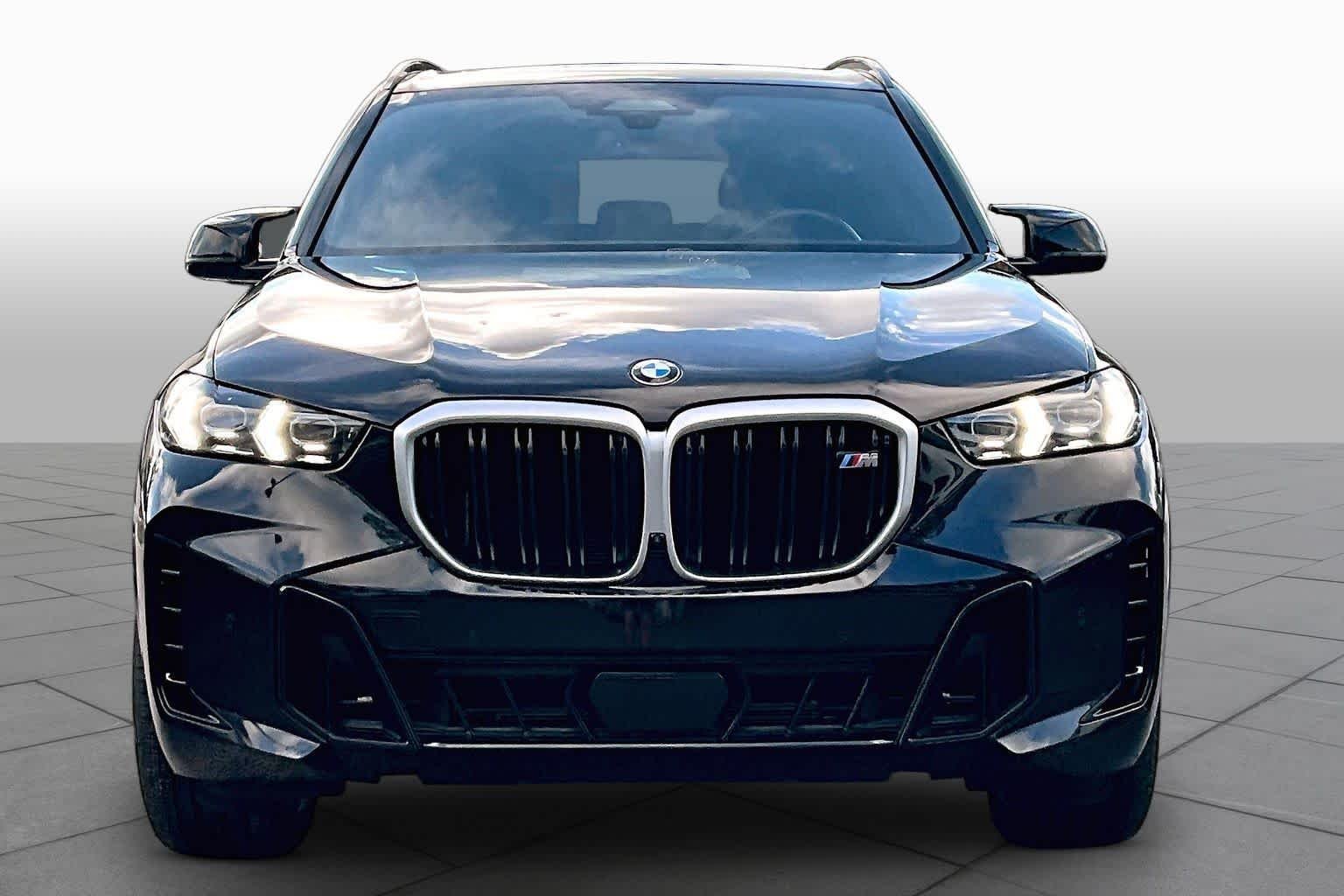 Used 2026 Black Sapphire Metallic BMW M60i image 4