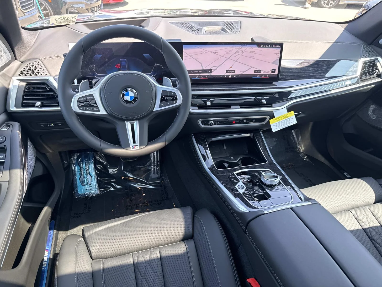 New 2026 Black Sapphire Metallic BMW M60i image 7