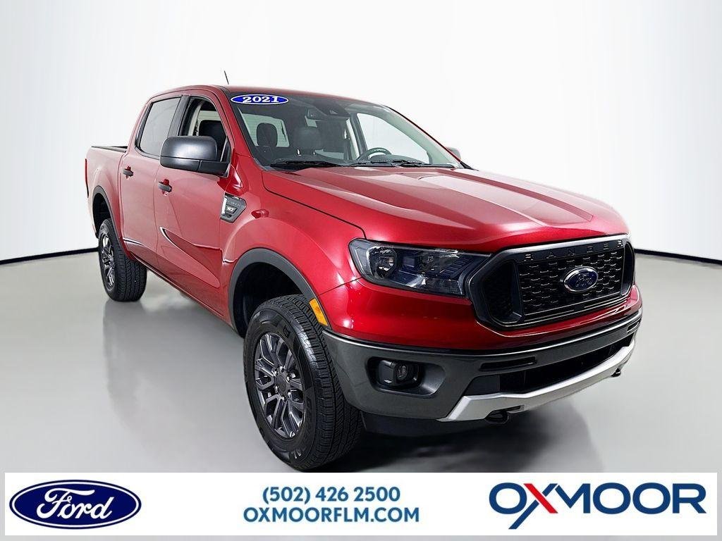 Used 2021 Rapid Red Metallic Tinted Clearcoat Ford XLT image 1