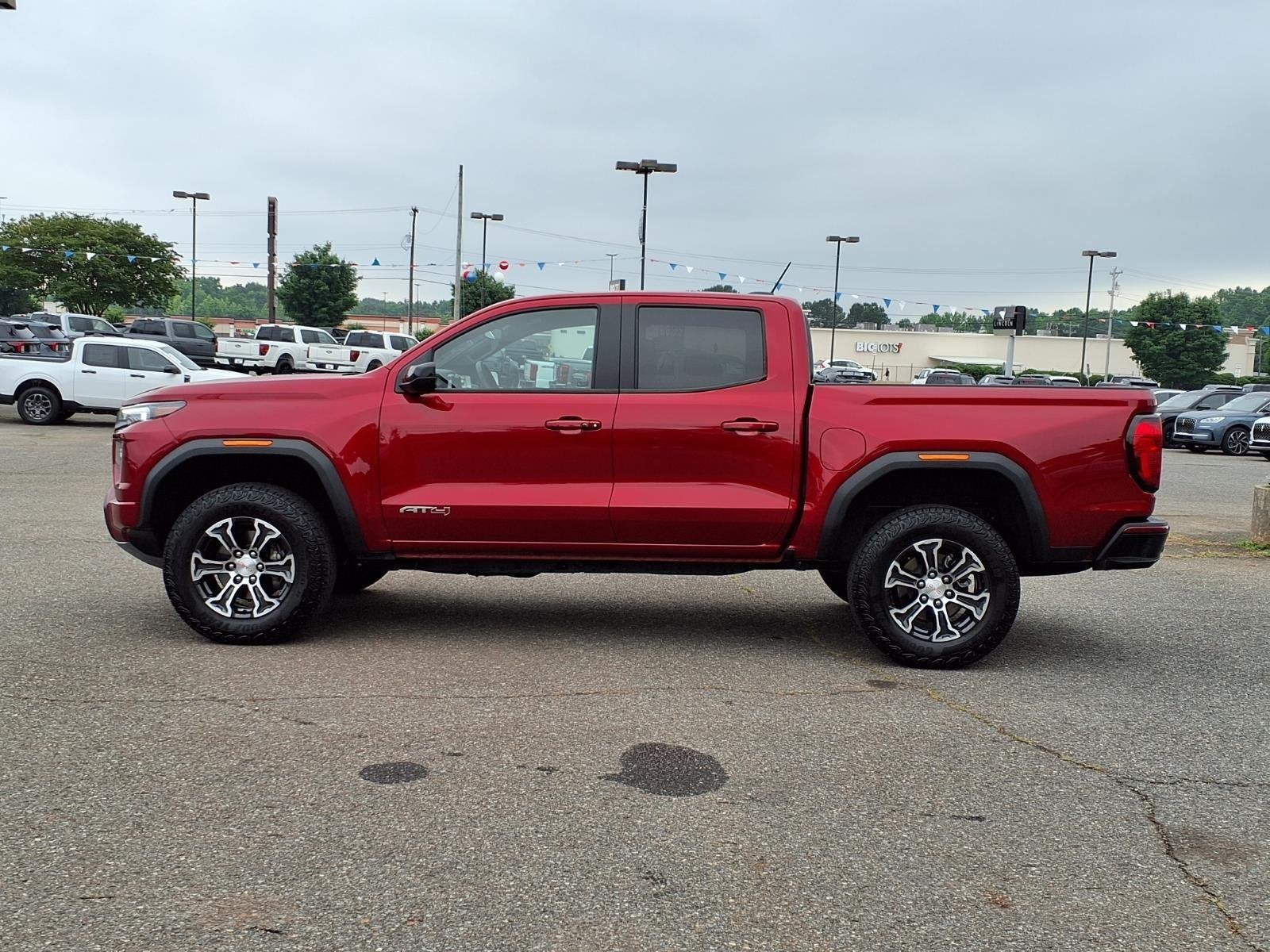 Used 2025 Volcanic Red Tintcoat GMC 4WD AT4 image 3