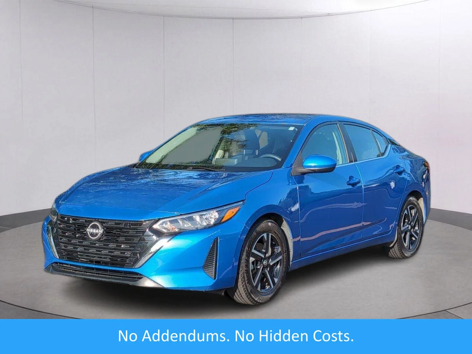 Used 2024 Electric Blue Metallic Nissan SV image 1