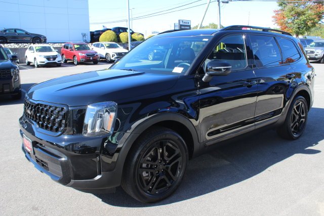 Used 2025 Black Kia EX X-Line image 2