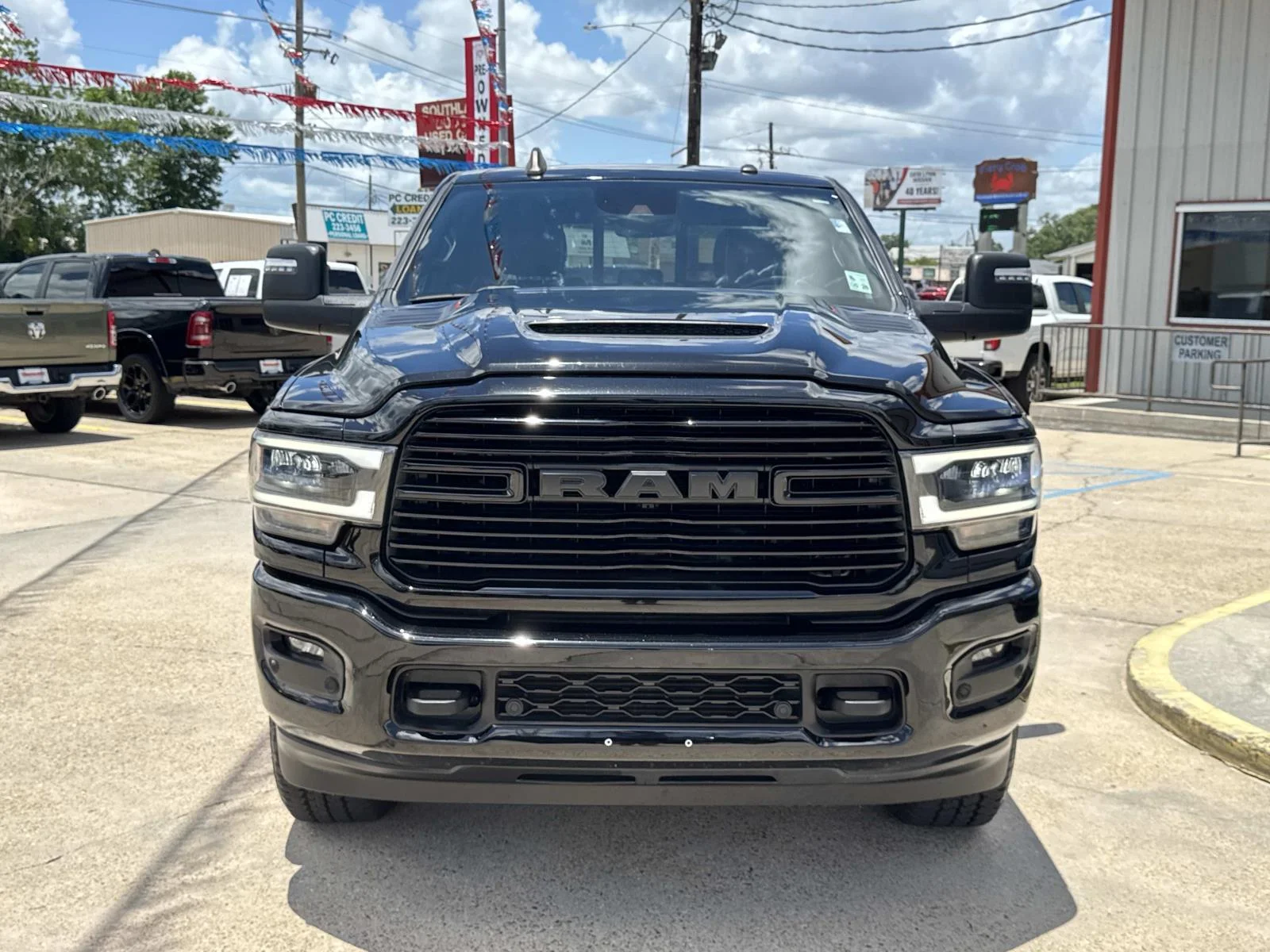 Used 2024 Diamond Black Crystal Pearlcoat Ram Laramie image 2