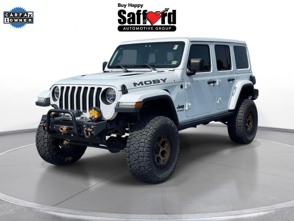 Used 2019 White Jeep Unlimited Sahara image 1