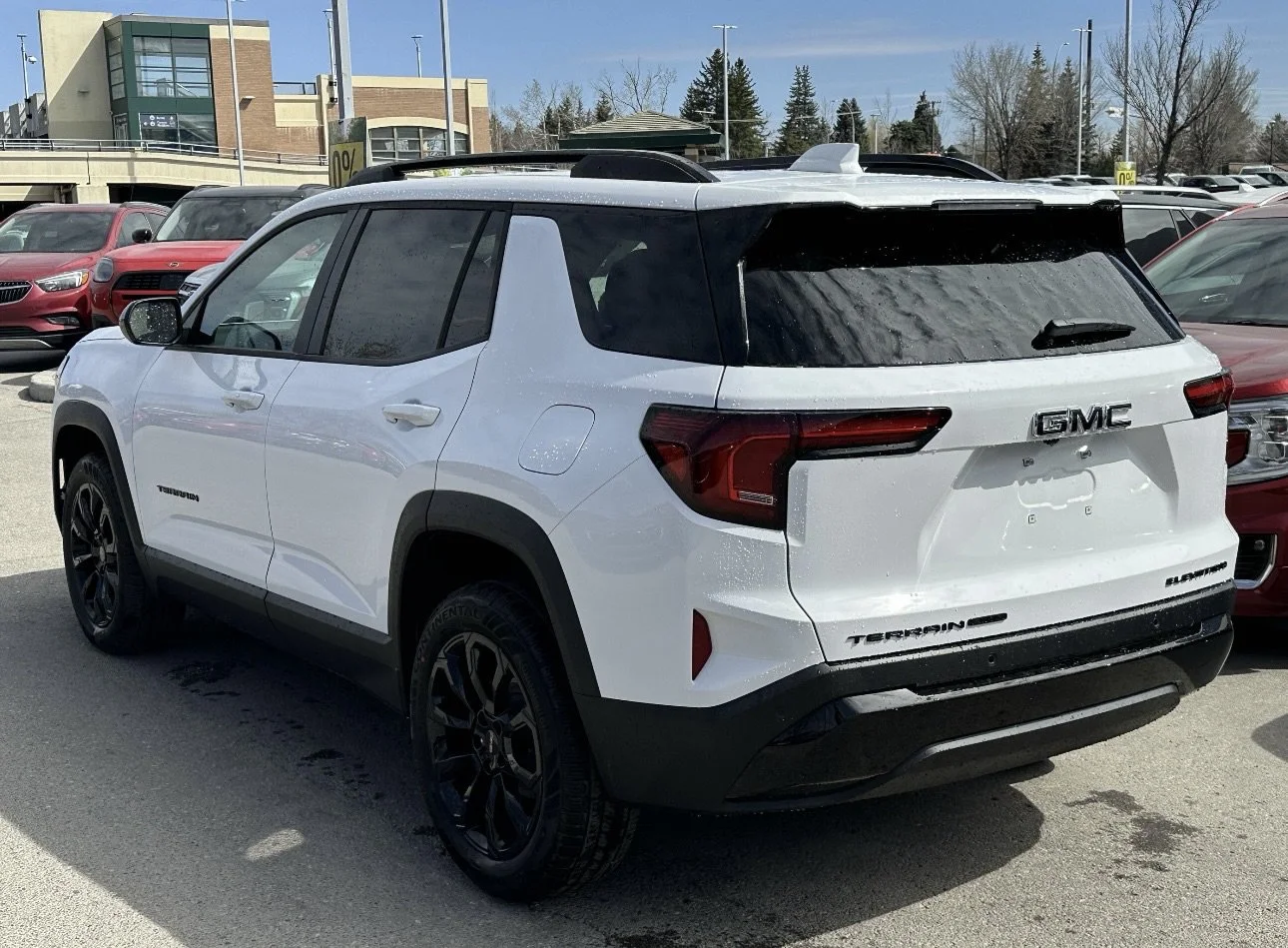 New 2026 Summit White GMC AWD Elevation image 4