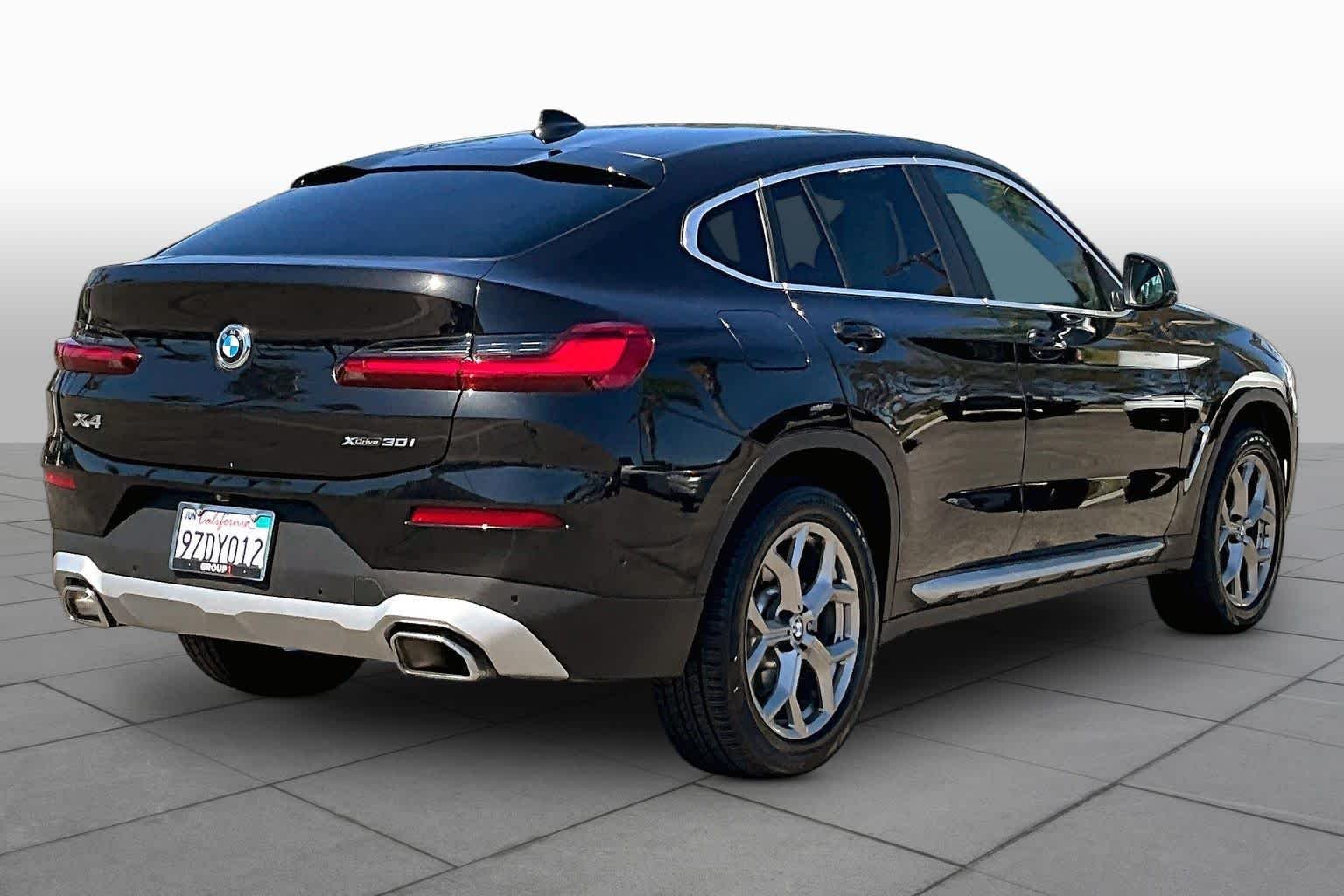 Used 2024 Black Sapphire Metallic BMW xDrive30i image 12