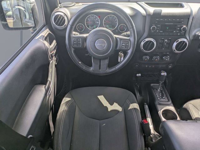Used 2015 Green Jeep Unlimited Sahara image 14