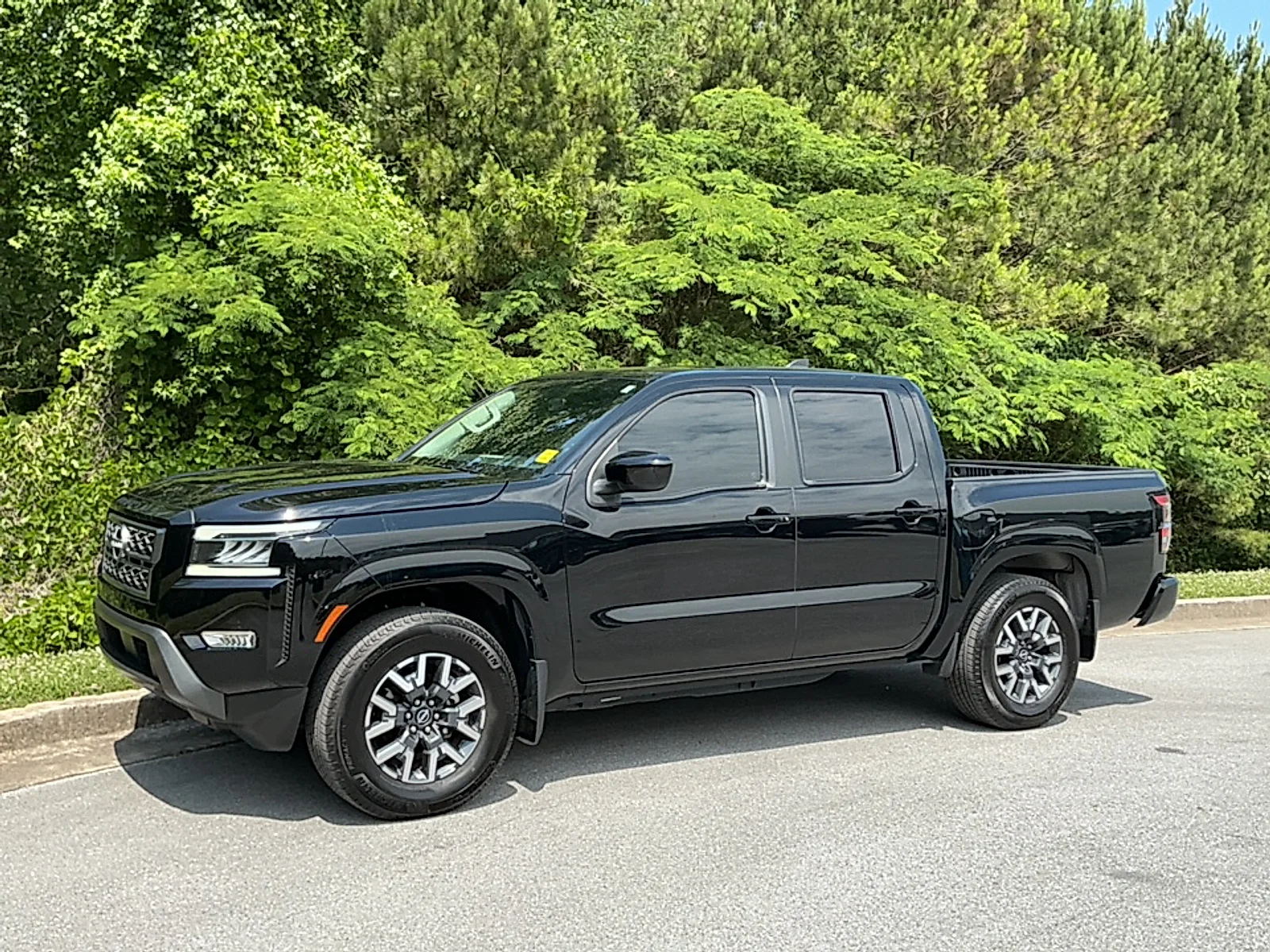 Used 2024 Super Black Nissan Crew Cab SL 4x2 image 4