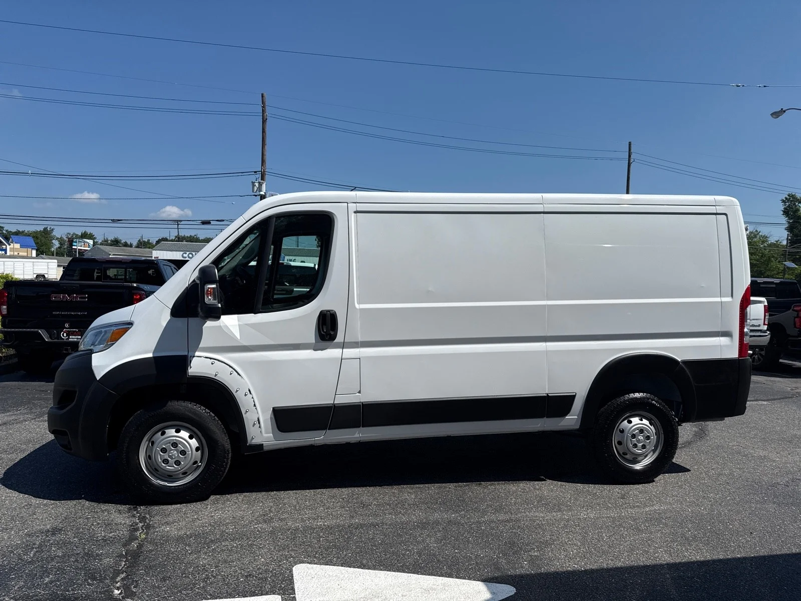 Used 2023 Bright White Clearcoat Ram Low Roof WB image 5