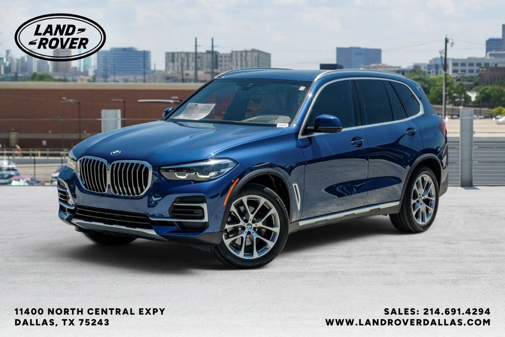 Used 2022 Blue Metallic BMW sDrive40i image 1