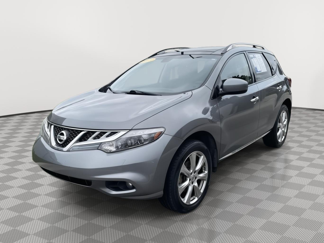 Used 2013 Gun Metallic Nissan LE image 11