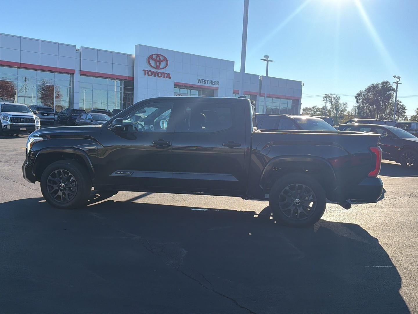 Used 2024 Midnight Black Metallic Toyota Platinum image 6