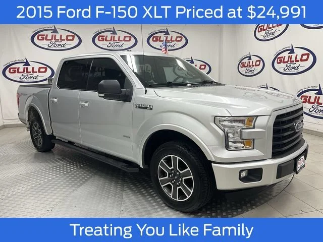 Used 2015 Ingot Silver Ford XLT image 1