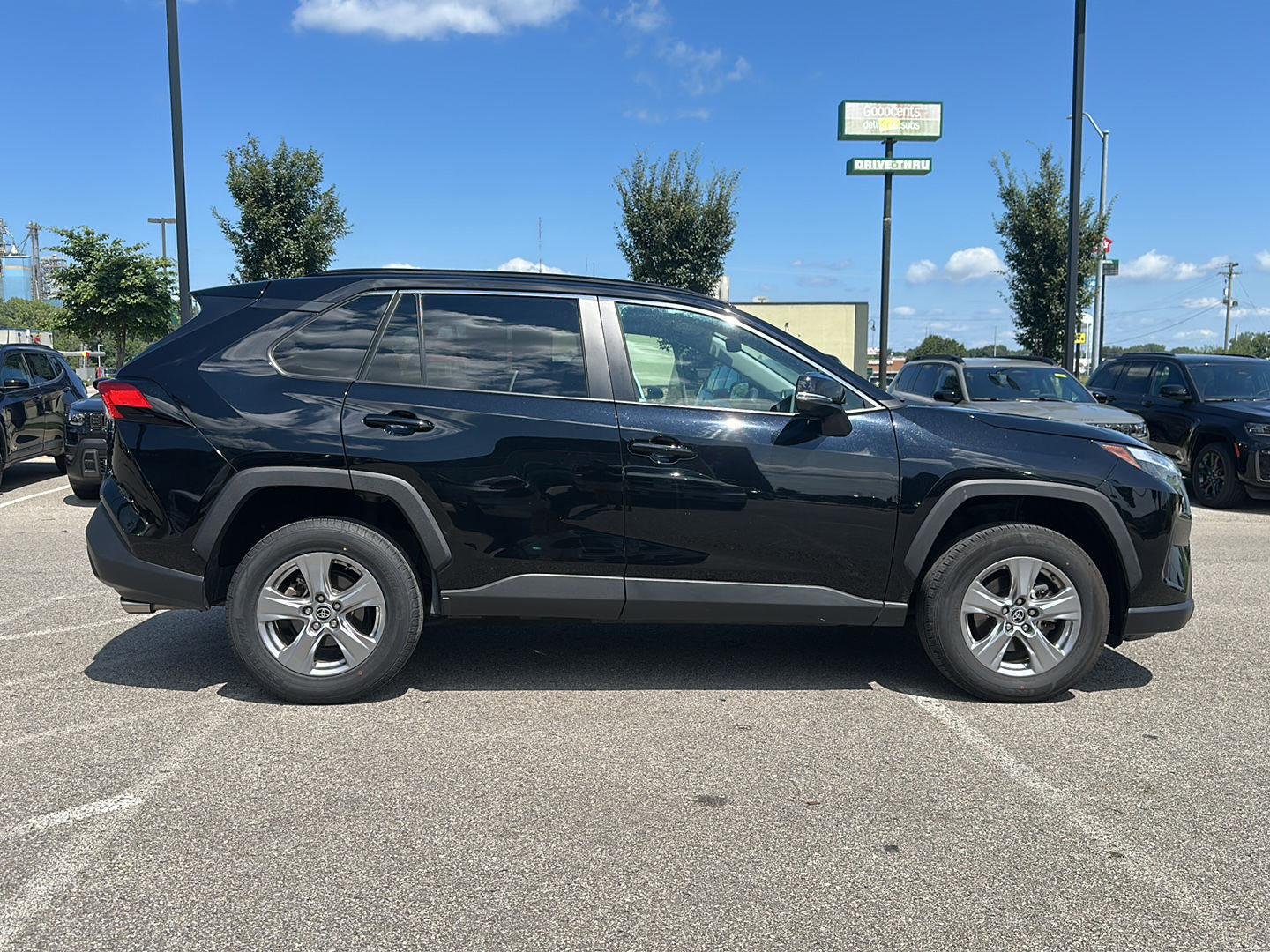 Used 2025 Midnight Black Metallic Toyota XLE image 4