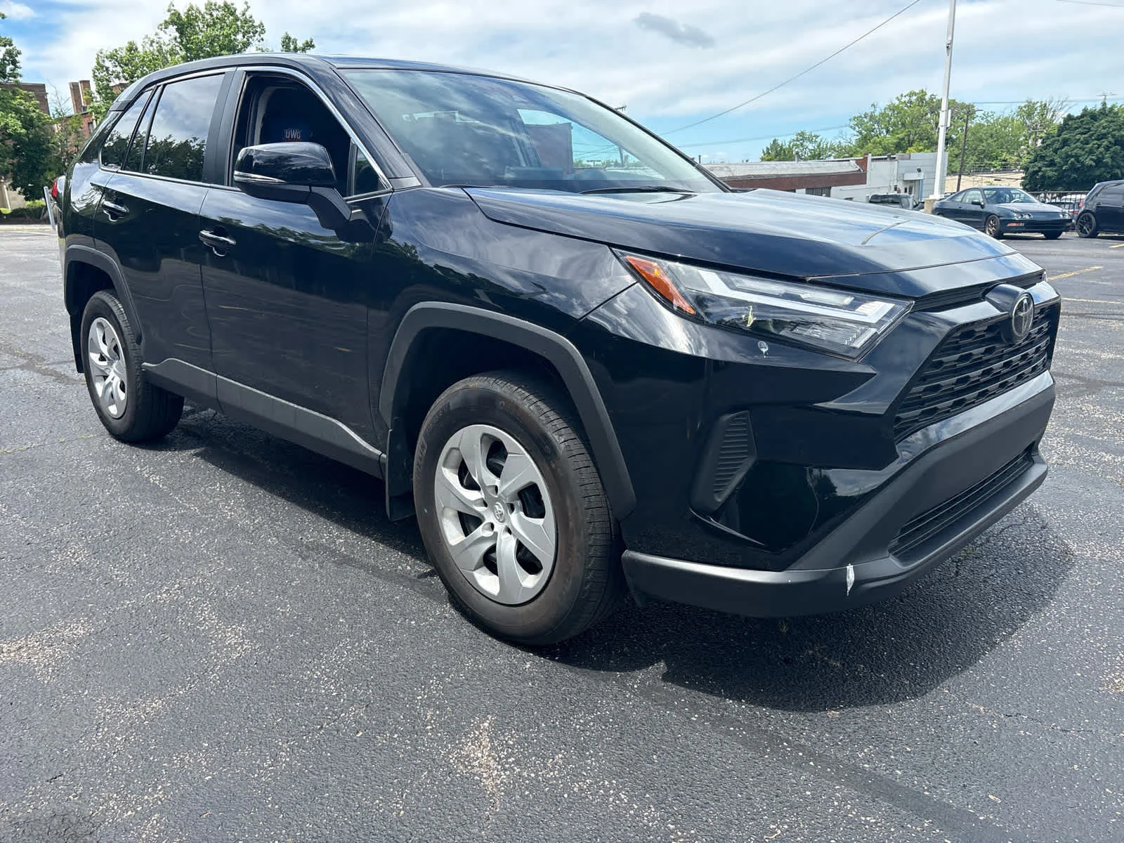 Used 2024 Midnight Black Metallic Toyota LE image 11