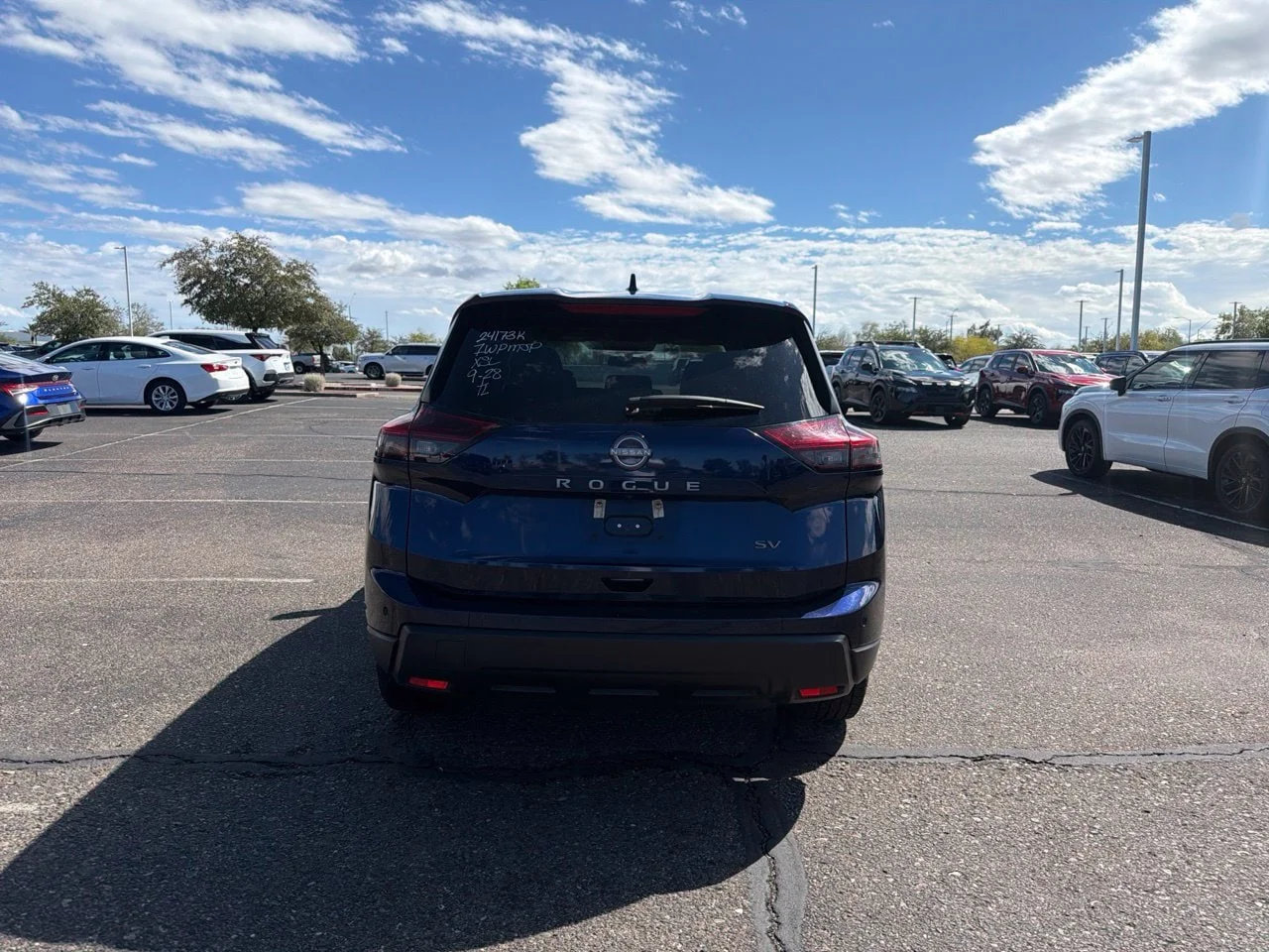 Used 2024 Deep Ocean Blue Pearl Nissan SV image 5