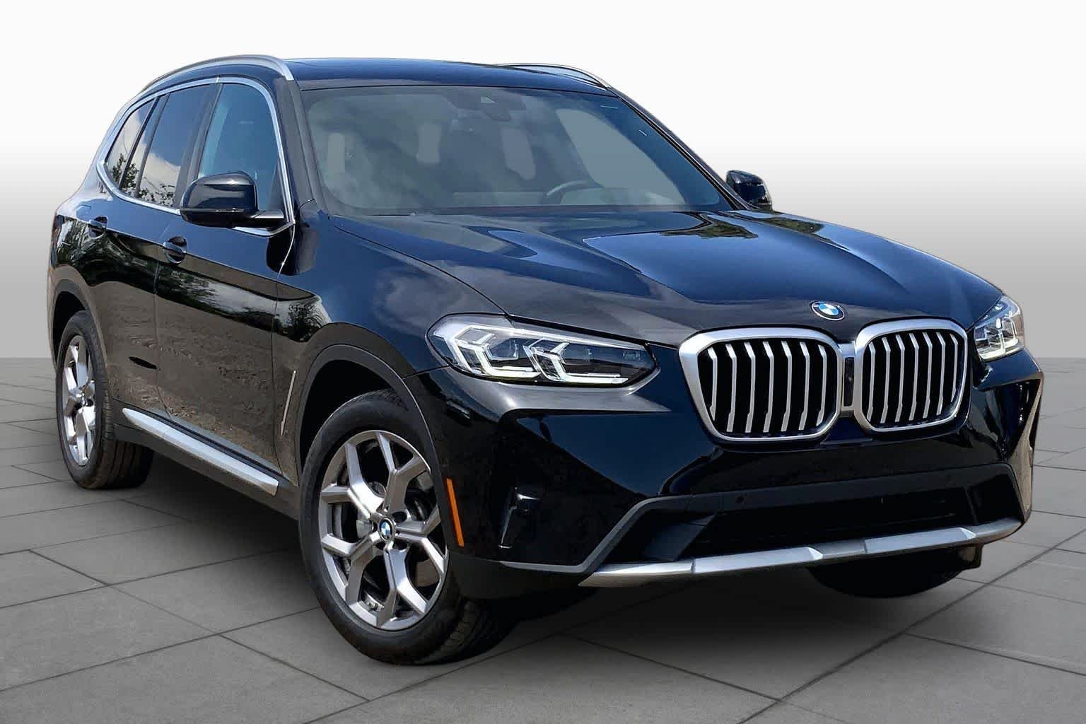 Used 2023 Black Sapphire Metallic BMW xDrive30i image 2