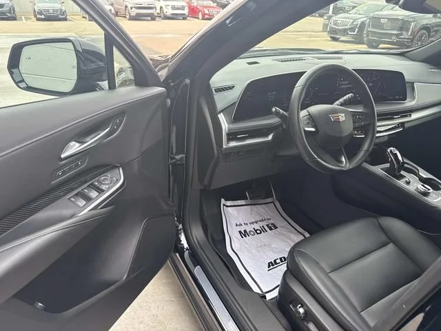 Used 2025 Stellar Black Metallic Cadillac Sport image 14