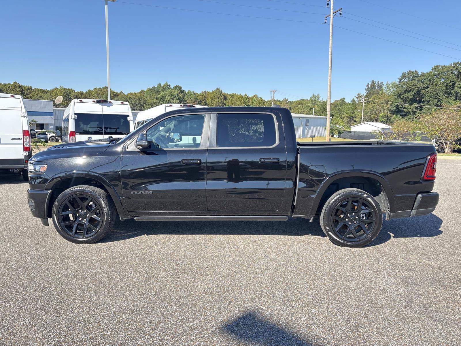 Used 2025 Diamond Black Crystal Pearlcoat Ram Laramie image 7
