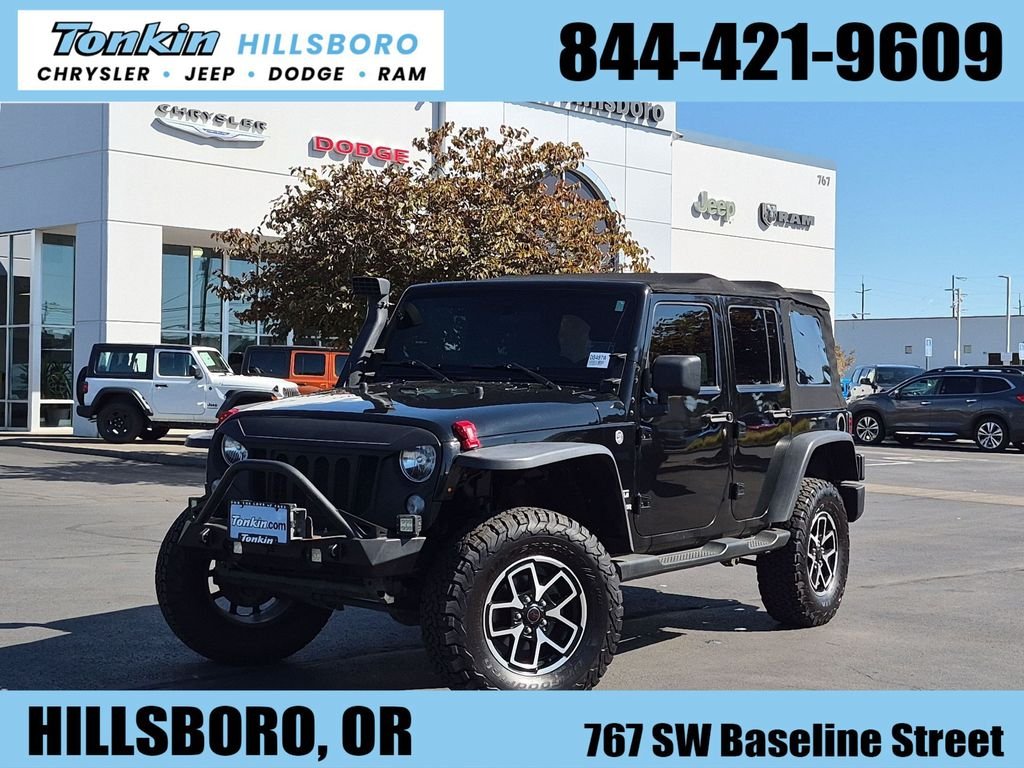 Used 2015 Black Clearcoat Jeep Unlimited Sport image 1