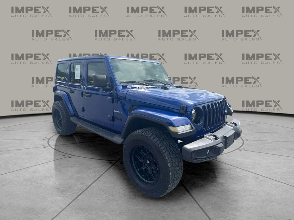 Used 2018 Blue Jeep Unlimited Sahara image 4