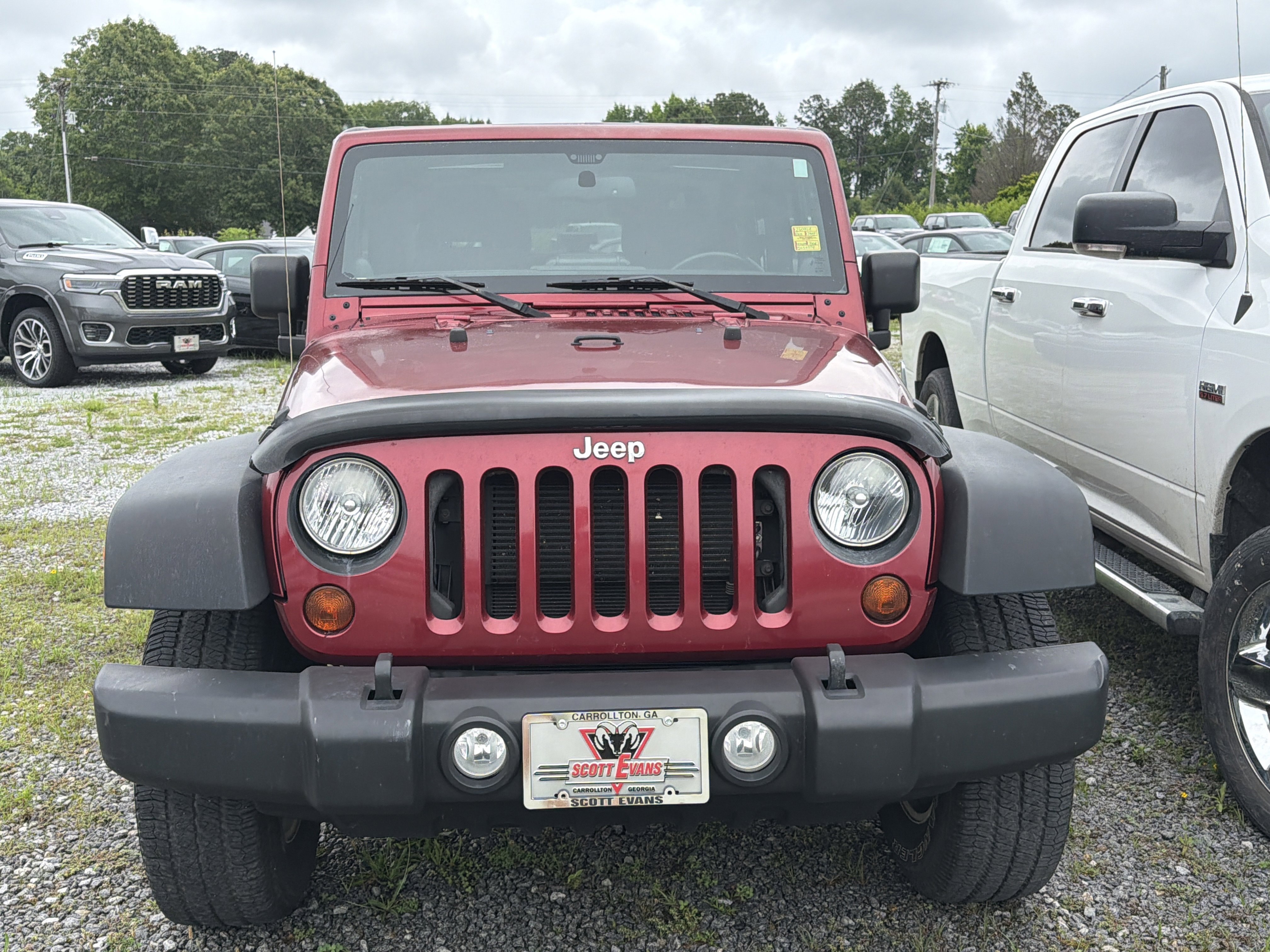 Used 2013 Deep Cherry Red Crystal Pearl Jeep Sport image 2