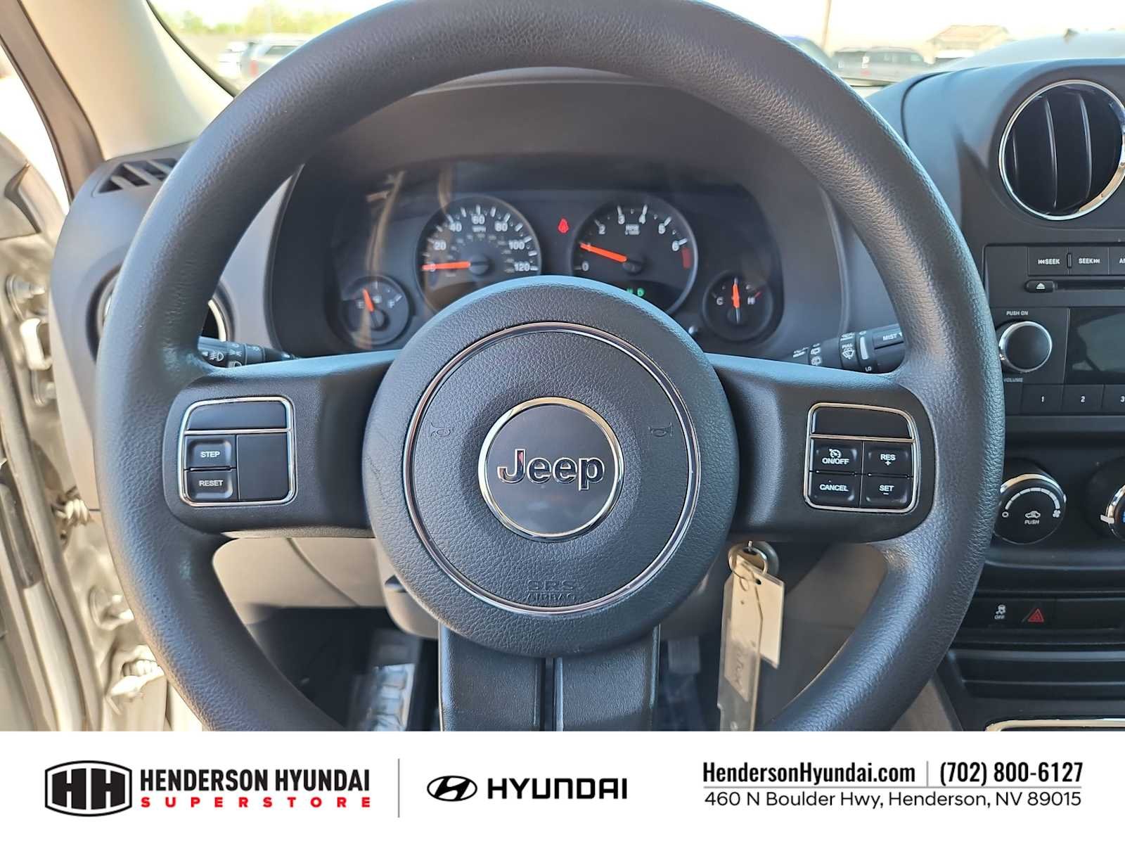 Used 2011 Bright Silver Metallic Jeep Sport image 22