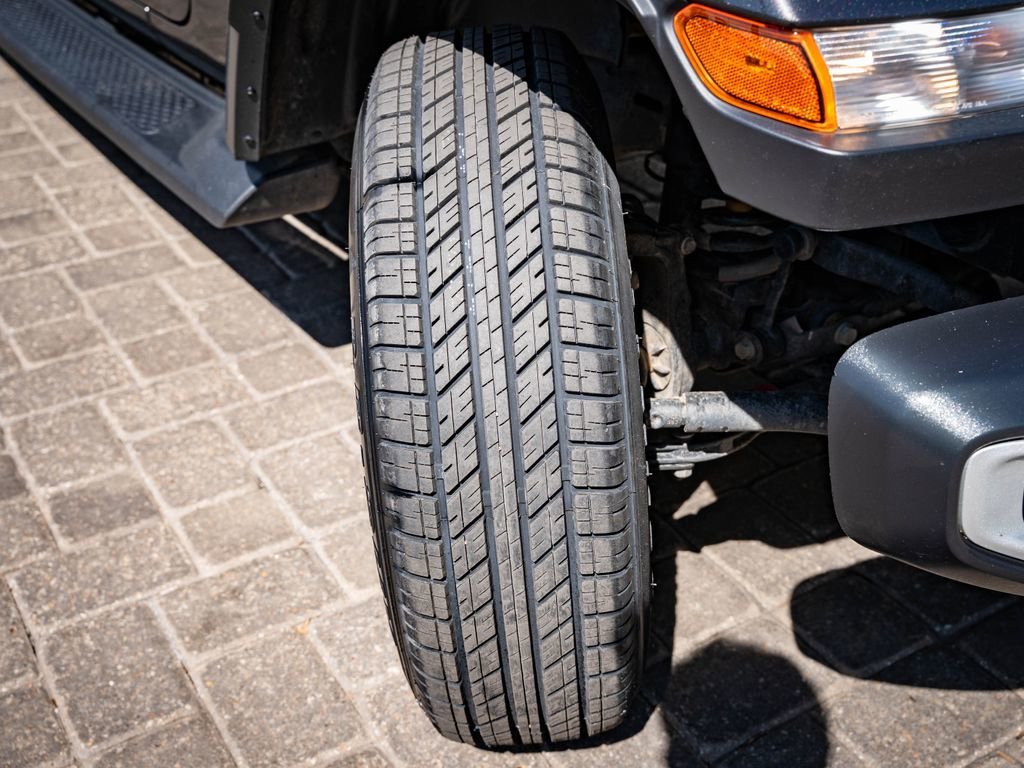 Used 2023 Granite Crystal Metallic Clearcoat Jeep Sport S image 52