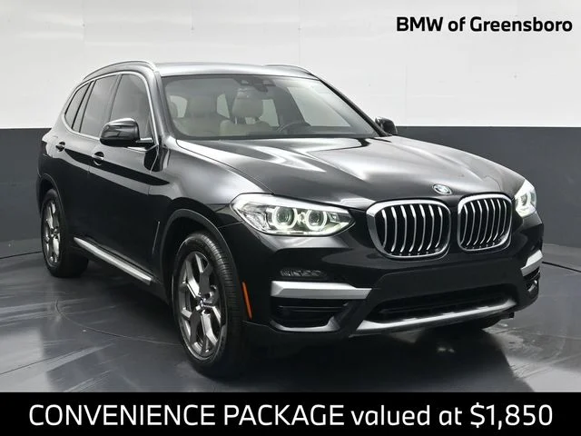 Used 2021 Black BMW sDrive30i image 1