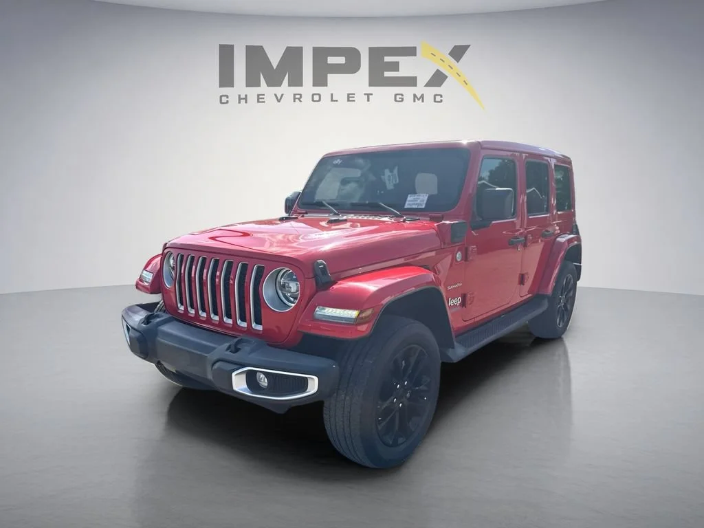 Used 2021 Red Jeep Unlimited Sahara image 1