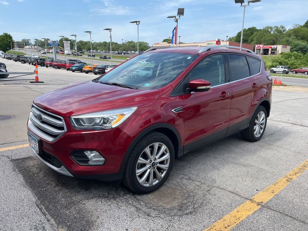 Used 2017 Ruby Red Metallic Ford Titanium image 1