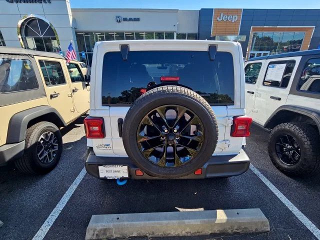 Used 2022 Black Jeep Unlimited Sahara 4xe image 4