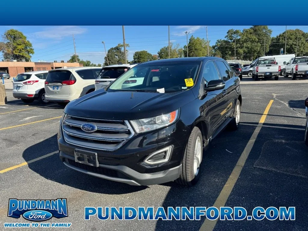 Used 2018 Shadow Black Ford SEL image 1