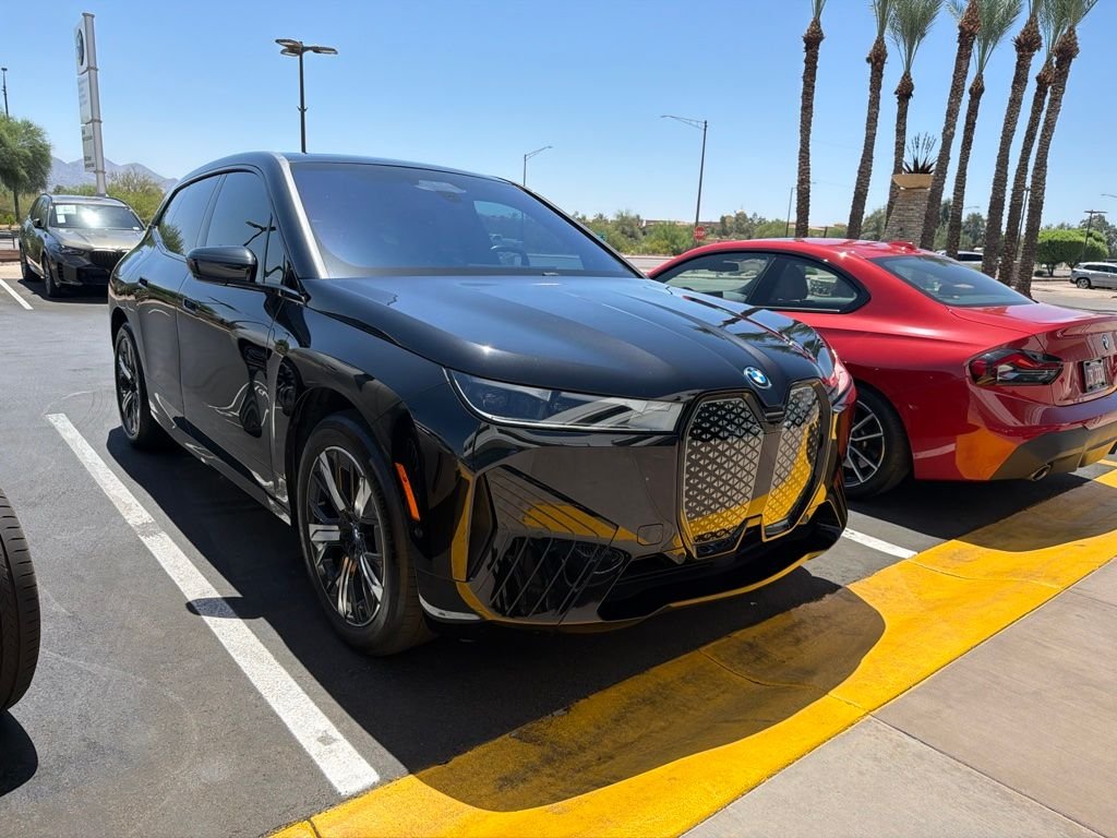 Certified Used 2024 Black Sapphire Metallic BMW xDrive50 image 2