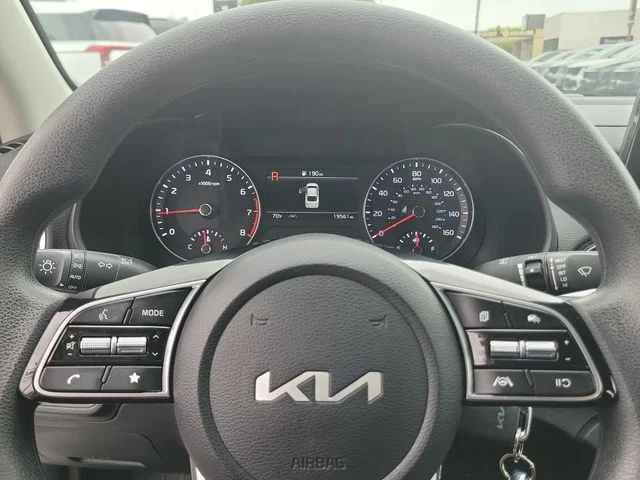 Used 2024 Snow White Pearl Kia LXS image 25