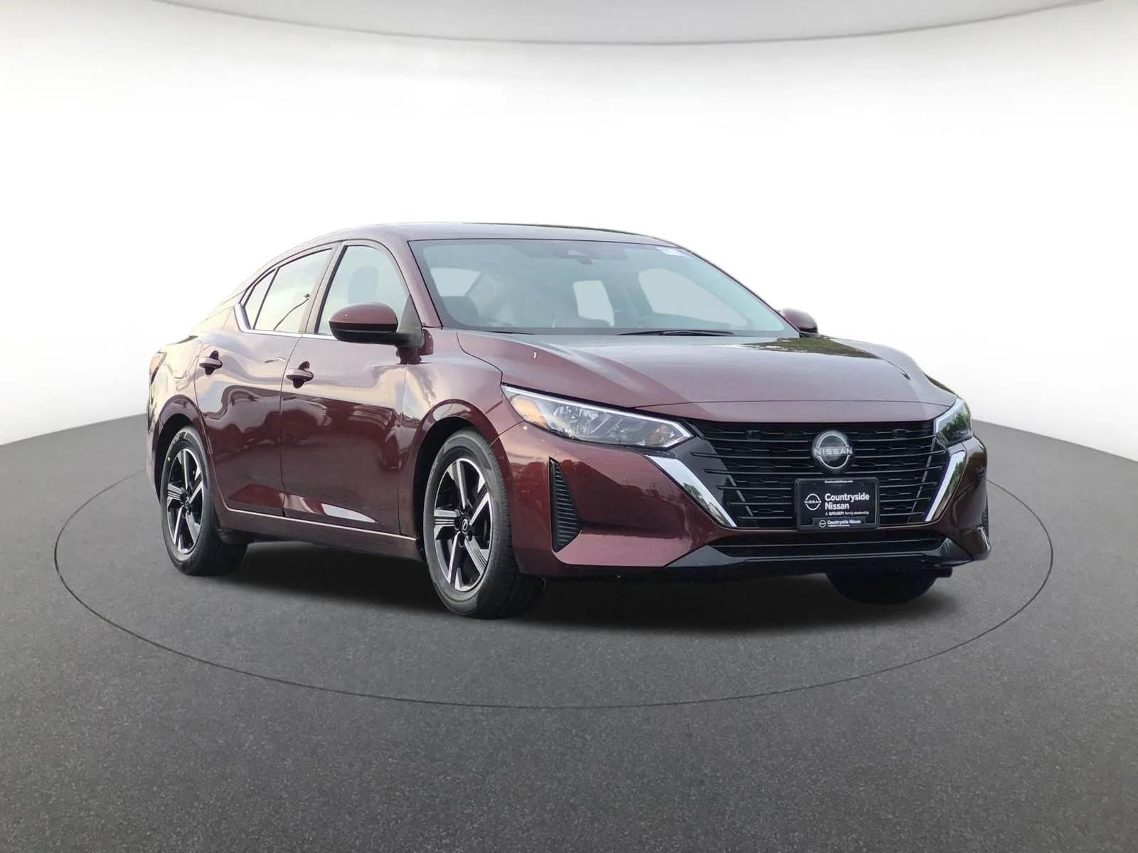 Used 2024 Rosewood Metallic Nissan SV image 3