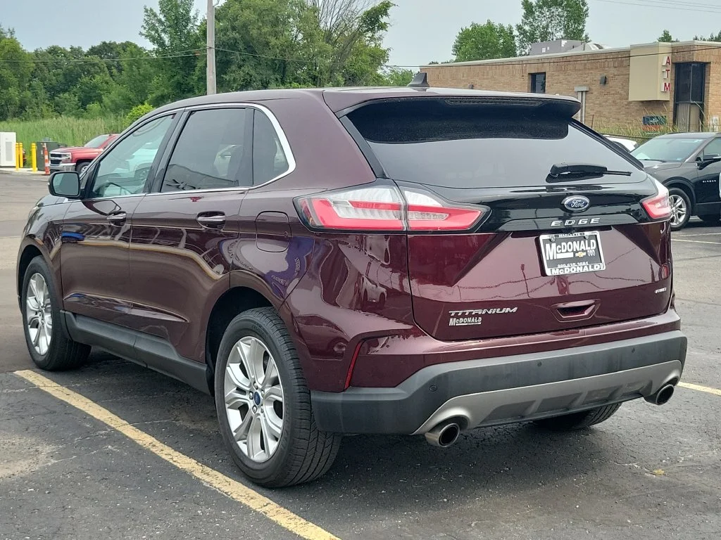 Used 2021 Ford Edge Titanium with VIN 2FMPK4K93MBA20853 for sale in Clare, MI