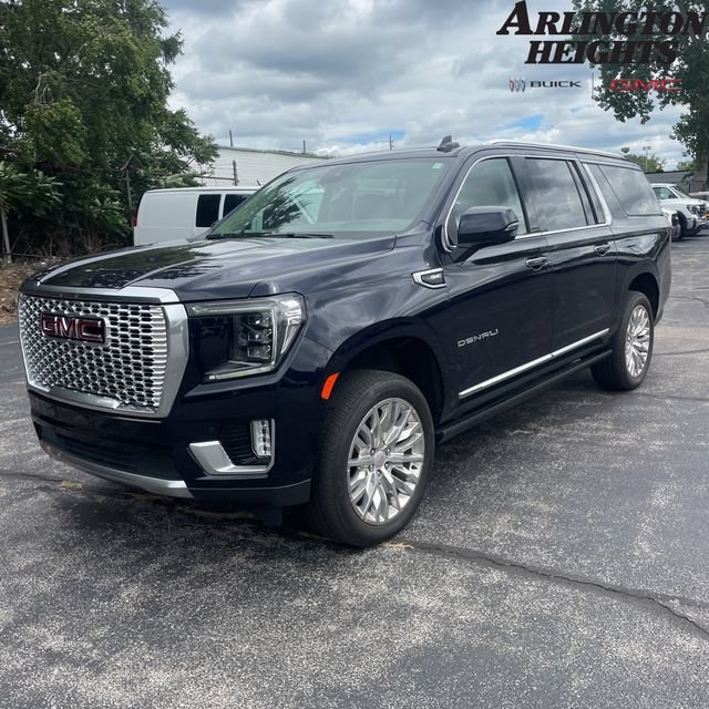 Used 2024 Midnight Blue Metallic GMC Denali image 1