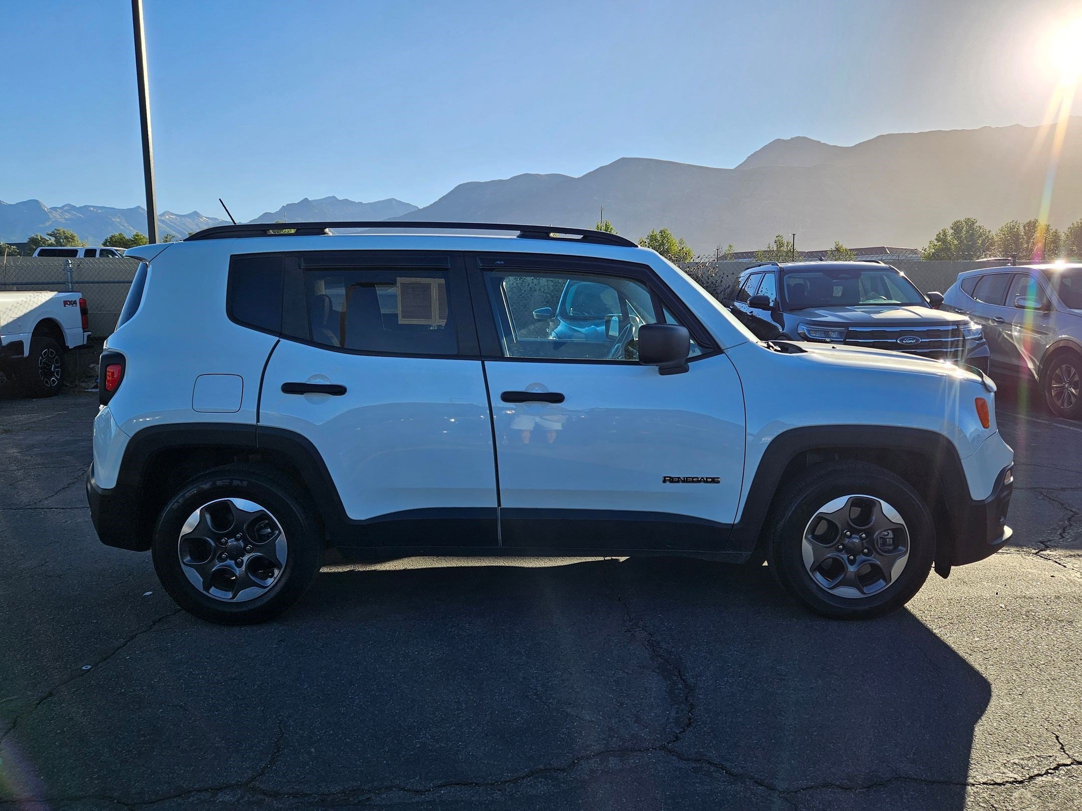 Used 2017 Alpine White Jeep Sport image 14