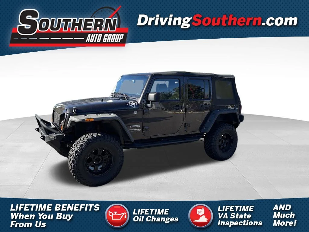 Used 2013 Brown Jeep Unlimited Sport image 1