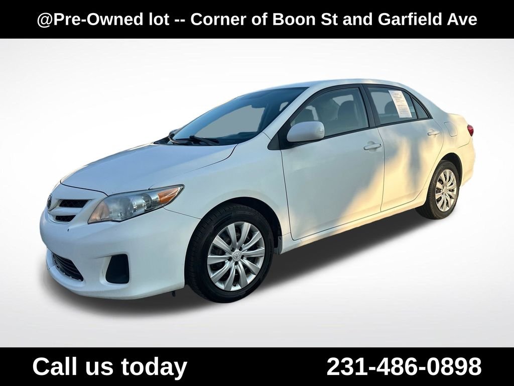 Used 2012 White Toyota LE image 1