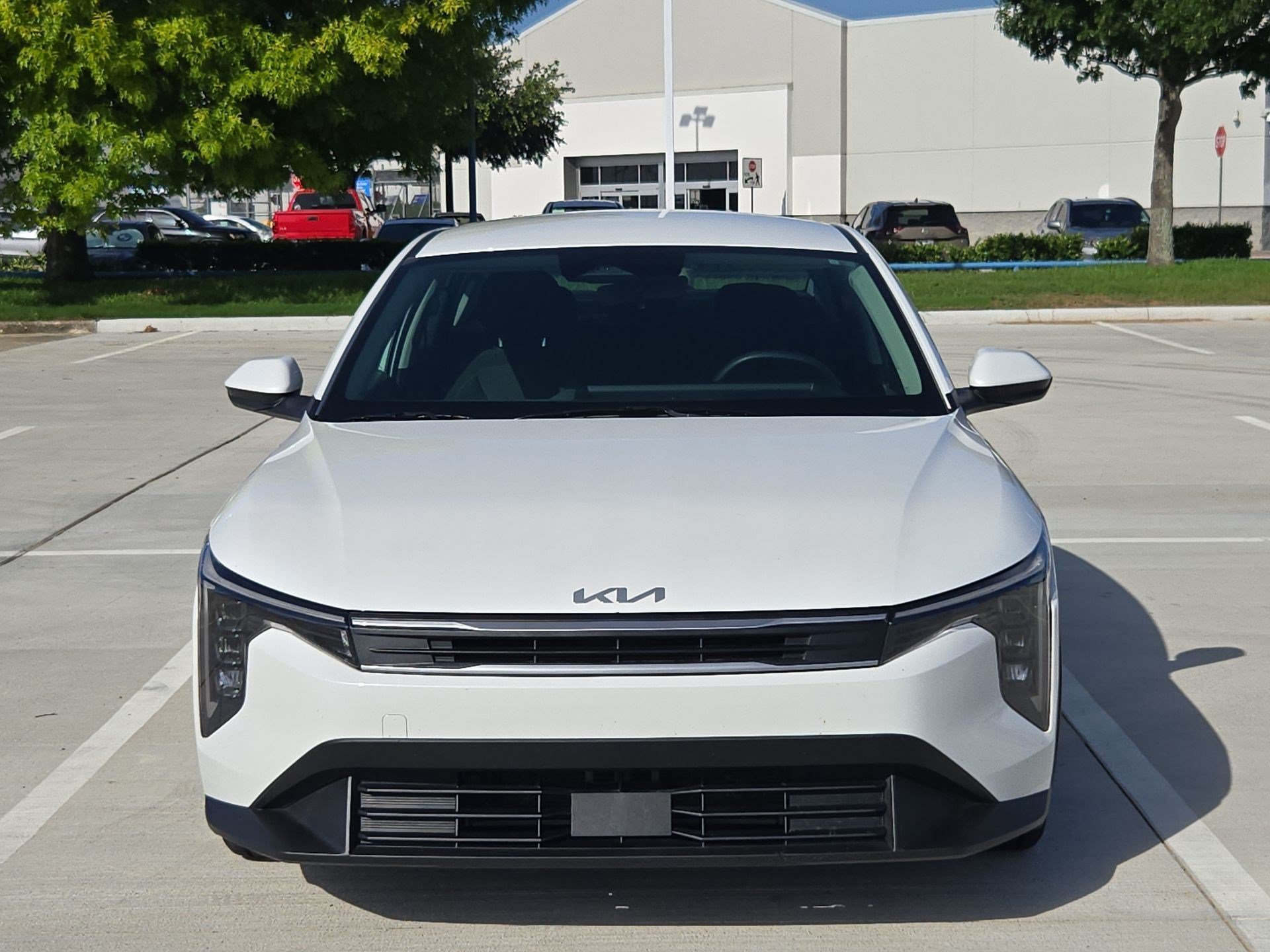 Used 2025 Snow White Pearl Kia LXS image 8