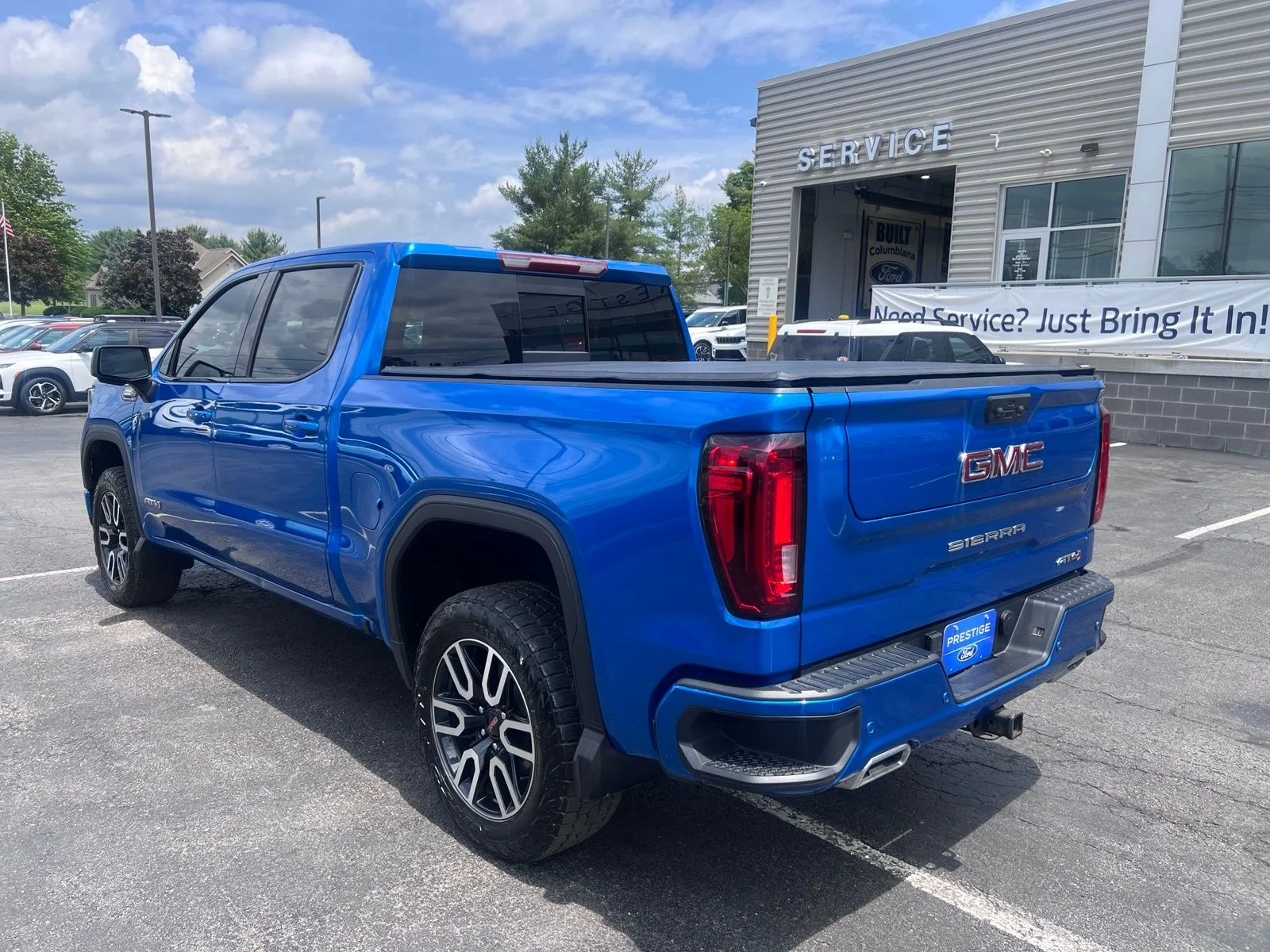 Used 2024 Blue Metallic GMC AT4 image 5