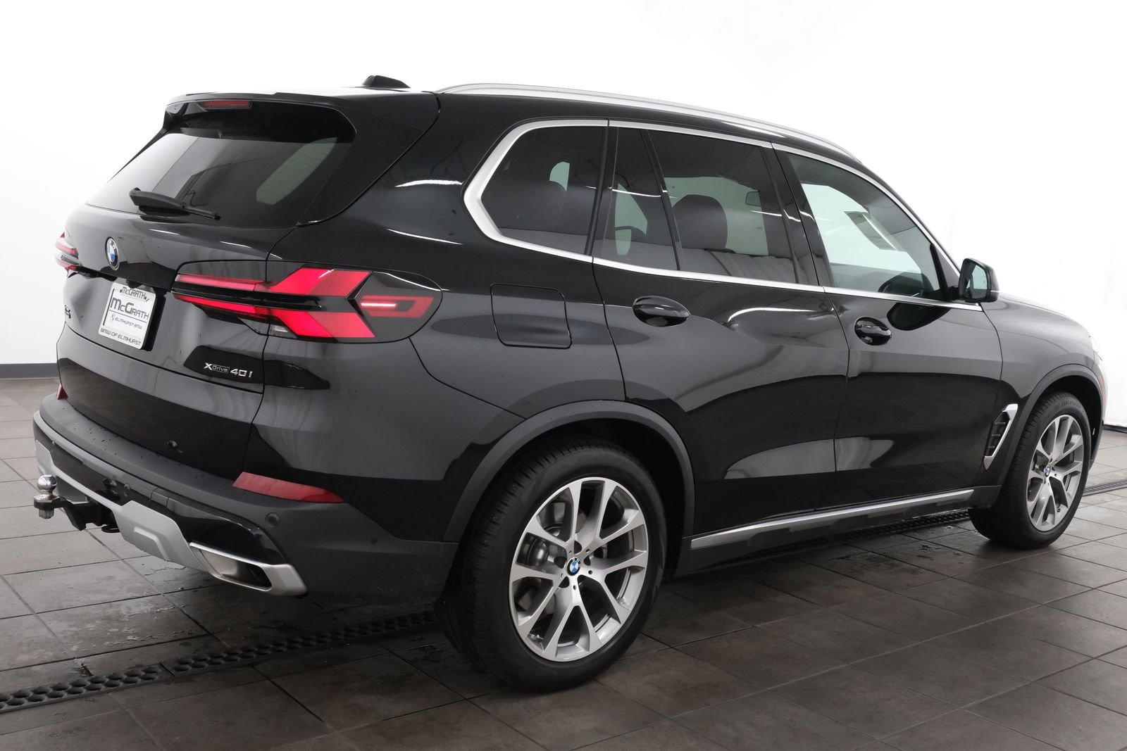 Certified Used 2024 Black Sapphire Metallic BMW xDrive40i image 6