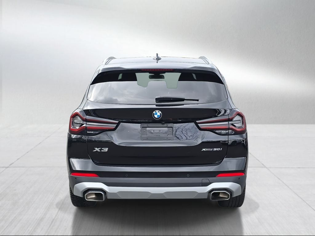 Used 2024 Black Sapphire Metallic BMW xDrive30i image 4