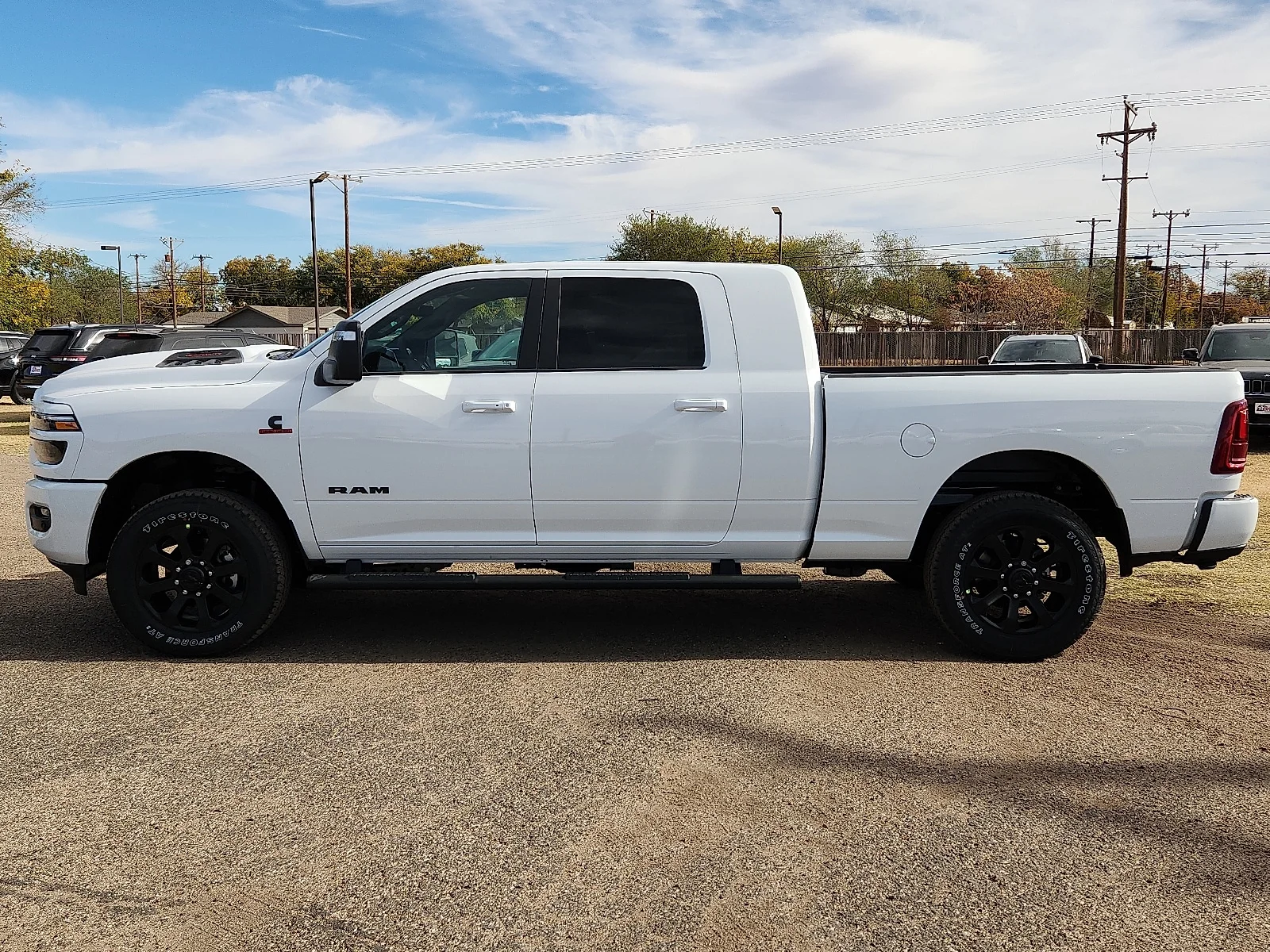 New 2026 PW7 Bright Whit Ram LARAMIE MEGA CAB 4X4 6