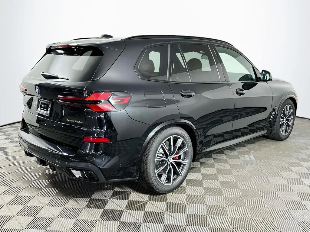 New 2026 Black Sapphire Metallic BMW xDrive50e image 5