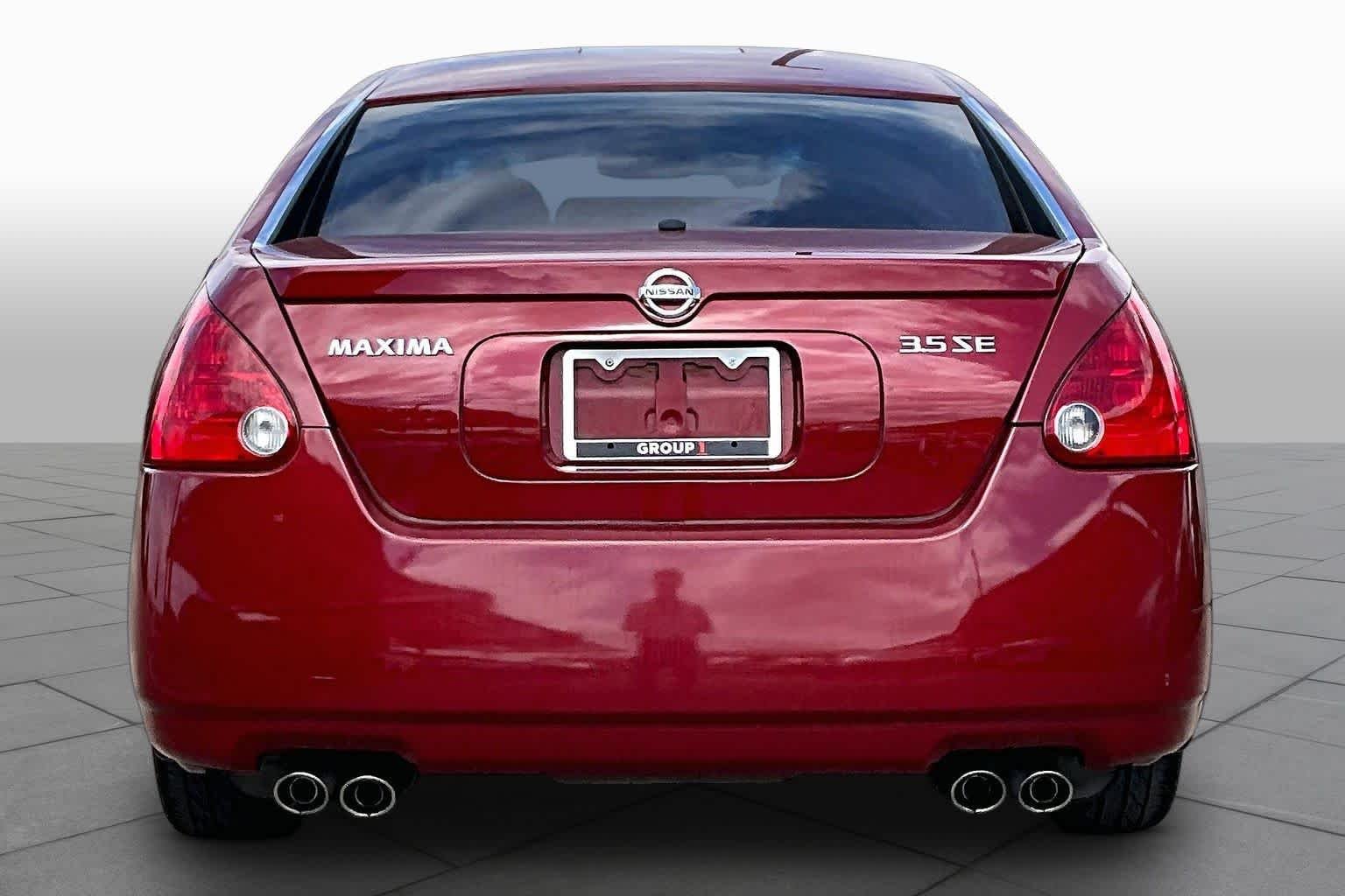 Used 2004 Red Opulence Metallic Nissan SE image 4