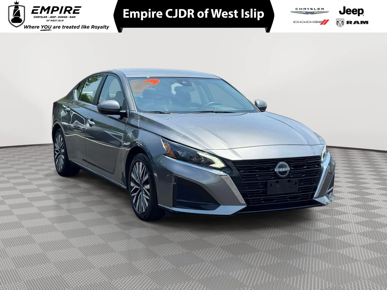 Used 2023 Gun Metallic Nissan SV FWD image 1