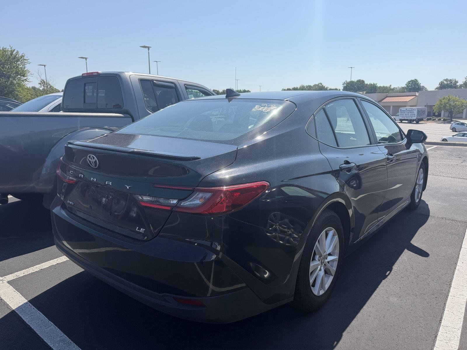 Used 2025 Midnight Black Metallic Toyota LE image 17